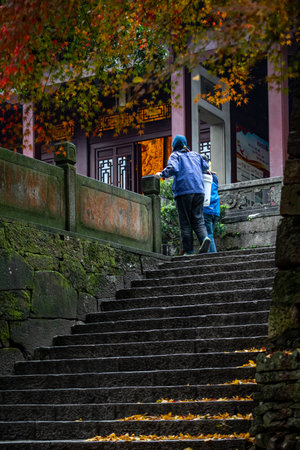 The tourists are walking in the park, tangshan city, hebei province, China.の写真素材