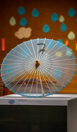 Colorful umbrella on display in a souvenir shop in Lisbon, Portugalのeditorial素材
