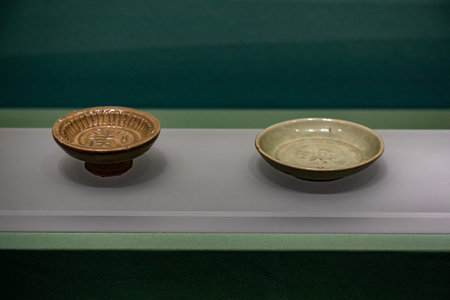 Two ceramic bowls on a table in a museum, Beijing, China
