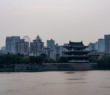 Landscape view of a lake and buildings in China.の写真素材
