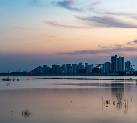 Landscape of the city at sunset in Hangzhou, China.の写真素材