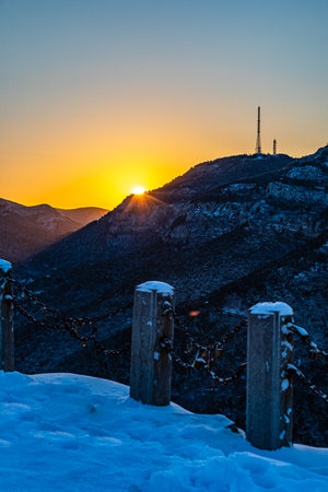 Sunset at the top of the mountain in winter, Sochi, Russiaの写真素材