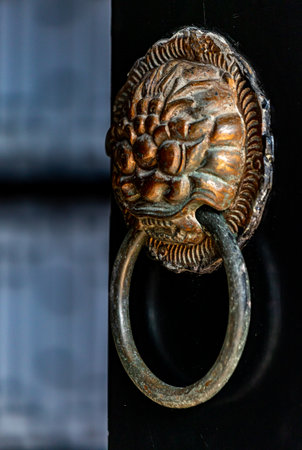 door knocker in morocco africa old wood and metalの写真素材