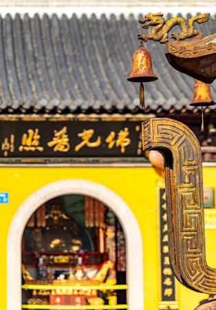 Ancient Chinese bell in the temple, closeup of photo with selective focusの写真素材