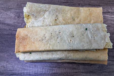 Bread rolls on wooden background. Top view. Copy space.