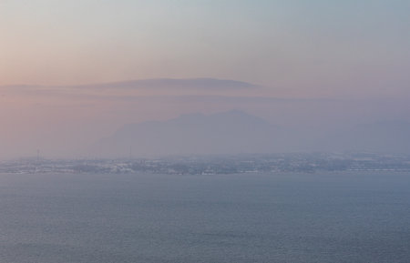 Sunset over the sea and the city of Sochi, Russia.の写真素材