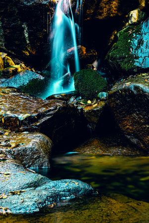 Waterfall in the forest, Thailand. (Selective focus)