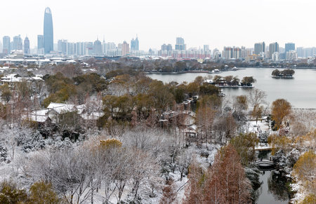 Winter landscape of the city with a view of the lake and skyscrapersのeditorial素材