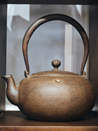Traditional Chinese teapot on the table, closeup of photo