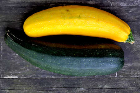 yellow and green zucchini on the tableの写真素材