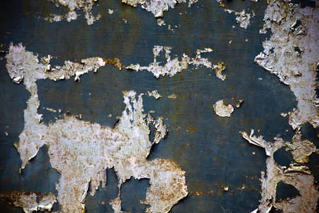 Old paint peeling off the Gateの写真素材