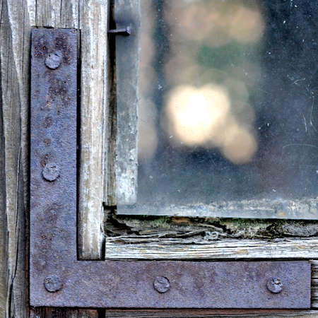 Old window - rusty hardwareの写真素材