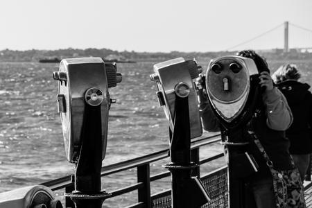 Binocular spyglass field glass on Liberty Island New York black and whiteの写真素材