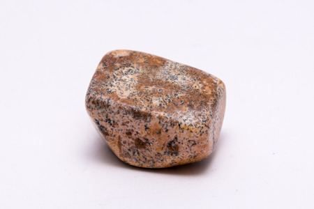 Red brown black dotted gemstone gem jewel mineral precious shinyの写真素材