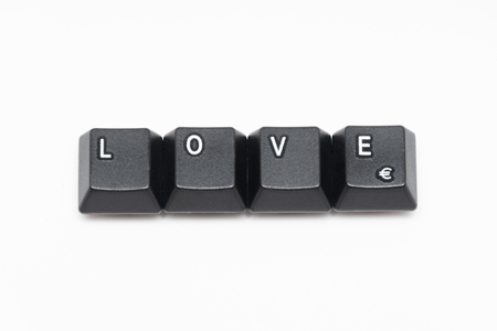 Single black keys of keyboard with different lettersの写真素材
