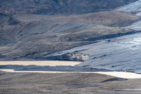 Langjokull Glacier melting ice giant dirty end of glacier covered in old volcanic ash