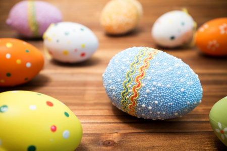 Easter eggs on wooden background の写真素材