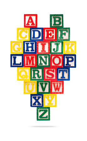 Wooden alphabet blocks isolated on white backgroundの写真素材