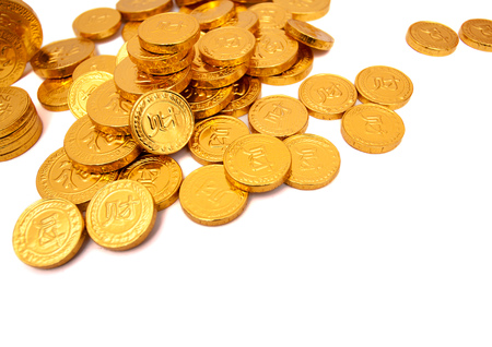 Pile of golden coin isolated on white backgroundの写真素材