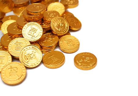 Pile of golden coin isolated on white backgroundの写真素材