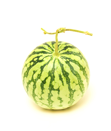 Whole watermelon isolated on white backgroundの写真素材