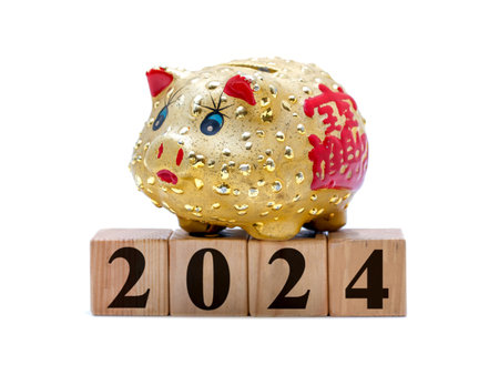 Piggy bank with new year 2014, isolated on white backgroundの写真素材