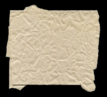 Crumpled sheet of paper on a black background. Design elementの写真素材