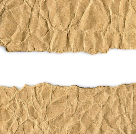 Blank crumpled brown paper textured background isolatedの写真素材