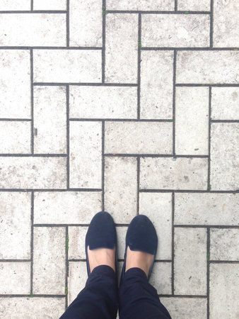 Feet on the tileの写真素材