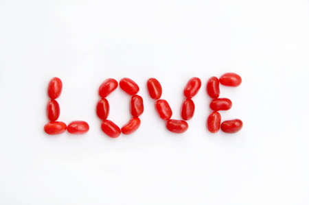 The word love made out of red jellybeansの写真素材