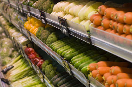 resh organic vegetables displayed in a storeの写真素材