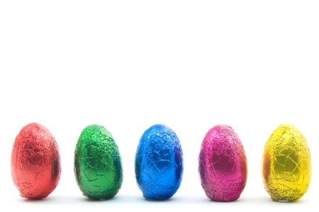 Colorful easter eggs in a row isolated on a white background