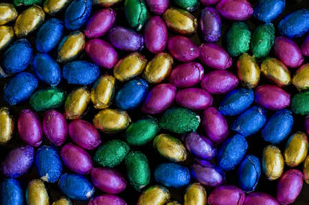 Background of colorful little easter eggsの写真素材