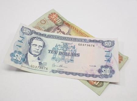 Jamaican Money isolated on a white background.の写真素材