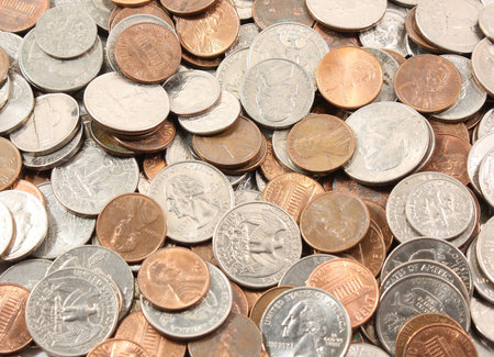 Background of US coins.  Quarters, nickels, dimes, pennies.