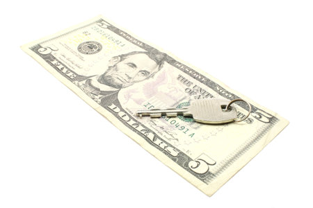 The Key to money shows a key on a five dollar bill.