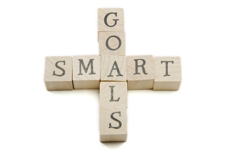 Smart Goals spelled out on wooden blocks showing smart concept.の写真素材