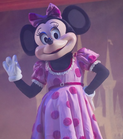 GREEN BAY, WI - FEBRUARY 10: Minnie Mouse in a pink dress waves to the crowd at the Disney Princesses show at the Resch Center on February 10, 2012 in Green Bay, Wisconsin.のeditorial素材