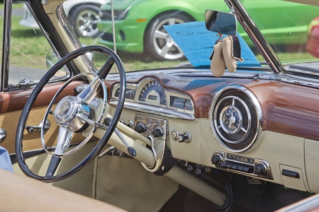 COMBINED LOCKS, WI - AUGUST 18: Interior of a gold 1951 Pontiac Eight Chieftain Convertible classic car at the 2nd Annual Horizon of Hope Generations Car and Truck Show on August 18, 2012 in Combined Locks, Wisconsin.のeditorial素材