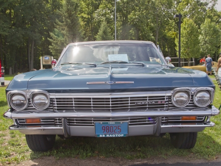 COMBINED LOCKS, WI - AUGUST 18: Front of a 1965 Chevrolet Impala SS Ragtop classic car at the 2nd Annual Horizon of Hope Generations Car and Truck Show on August 18, 2012 in Combined Locks, Wisconsin.のeditorial素材