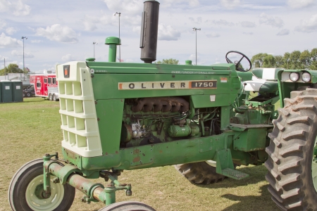 DE PERE, WI - AUGUST 18: An antique green Oliver 1750 diesel tractor parked before competing at the Tractor Pull event at the Brown County Fair on August 18, 2012 in De Pere, Wisconsin.のeditorial素材