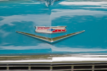 WAUPACA, WI - AUGUST 25: Emblem close up 1956 Chevy Bel Air car at the 10th Annual Waupaca Rod & Classic Car Club Car Show on August 25, 2012 in Waupaca, Wisconsin.のeditorial素材