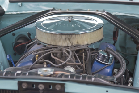 WAUPACA, WI - AUGUST 25: Engine of 1967 Aqua Blue Ford Mustang car at the 10th Annual Waupaca Rod & Classic Car Club Car Show on August 25, 2012 in Waupaca, Wisconsin.のeditorial素材