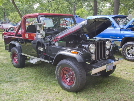WAUPACA, WI - AUGUST 25: 1980 Jeep Scrambler at the 10th Annual Waupaca Rod & Classic Car Club Car Show on August 25, 2012 in Waupaca, Wisconsin.のeditorial素材
