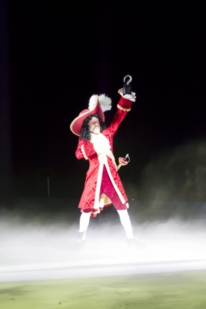 GREEN BAY, WI - MARCH 10: Captain Hook's big entrance in red coat, hat and skates at the Disney on Ice Treasure Trove show at the Resch Center on March 10, 2012 in Green Bay, Wisconsin.のeditorial素材