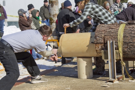 EAGLE RIVER, WI - MARCH 2:  Last cut at Lumberjack Two Man Bucksaw competition at Klondike Days on March 2, 2013 in Eagle River, Wisconsin.のeditorial素材