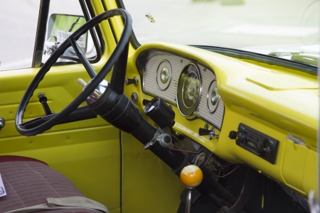WINNECONNE, WI - JUNE 1:  Inside of a 1970's Yellow U.S. Flag Ford Truck at Annual Car Show on Main Street June 1, 2013 in Winneconne, Wisconsin.のeditorial素材