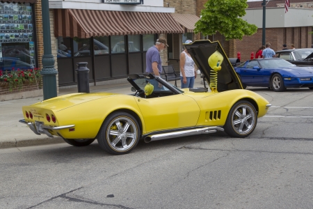 WINNECONNE, WI - JUNE 1:  Side of a Yellow 1968 Chevy Corvette Roadster car at Annual Car Show on Main Street June 1, 2013 in Winneconne, Wisconsin.のeditorial素材