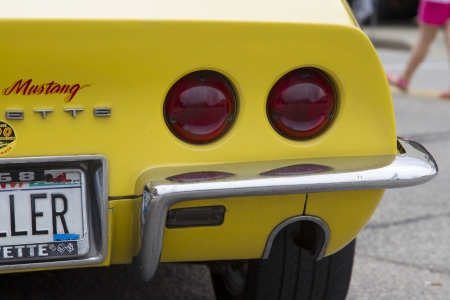 WINNECONNE, WI - JUNE 1:  Tail lights of a Yellow 1968 Chevy Corvette Roadster car at Annual Car Show on Main Street June 1, 2013 in Winneconne, Wisconsin.のeditorial素材