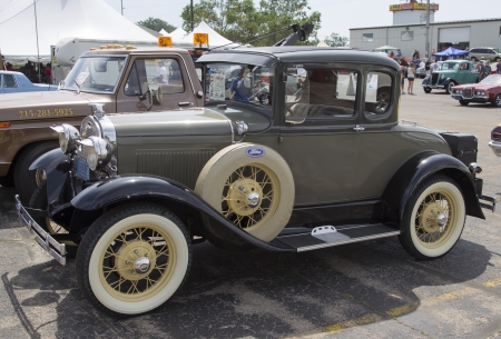 IOLA, WI - JULY 13:  Side of Olive 1930 Ford Model A Car at Iola 41st Annual Car Show July 13, 2013 in Iola, Wisconsin.のeditorial素材
